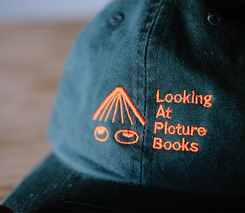 ADULT Looking At Picture Books Hat